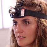 Patient wearing an eye-tracking headset for concussion testing