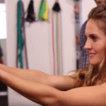Patient doing an arm and eye coordination rehabilitation exercise