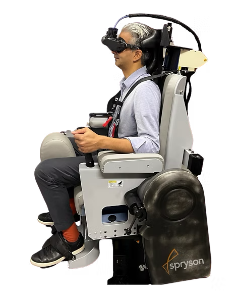Patient seated in the Spryson NOTC rotary chair wearing eye-tracking goggles